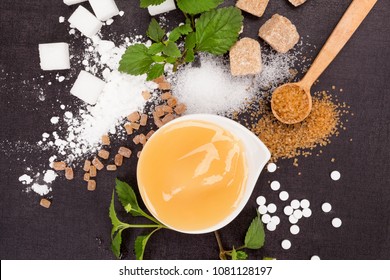 Various Types Of Sugar  And Artificial Sweeteners With Honey In Bowl From Above.