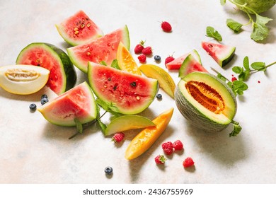 Various types of tasty ripe watermelon and melons with berry. - Powered by Shutterstock