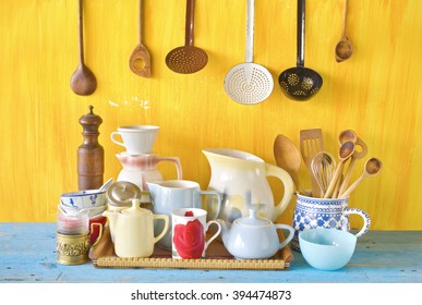 various vintage tableware and kitchen utensils