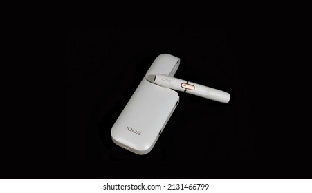 Varna, Bulgaria, 02.03.2022 - Heating Device For Tobacco White IQOS - Iqos Is A Line Of Heated Tobacco And Electronic Cigarette Products 