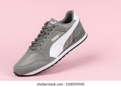 Varna , Bulgaria - AUGUST 18, 2021. PUMA Sport Shoe On Pink Background. Puma, A Major German Multinational Company. Product Shot