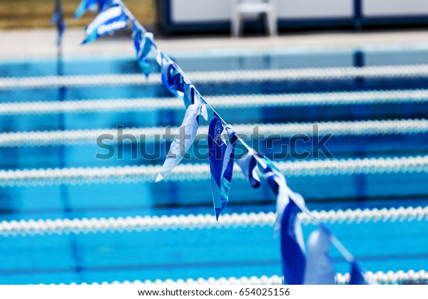 VARNA, BULGARIA -
CIRCA 2017: Sports swimming pool with dividing paths for
competition without swimmers. Cleaning the pool and preparing the
Olympic sports pool for
competitions