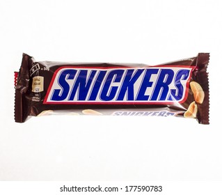 VARNA, BULGARIA - FEBRUARY 19, 2014: Snickers chocolate bar made by Mars, Incorporated. It consists of caramel and peanuts, Snickers is the best selling brand chocolate bars in the world