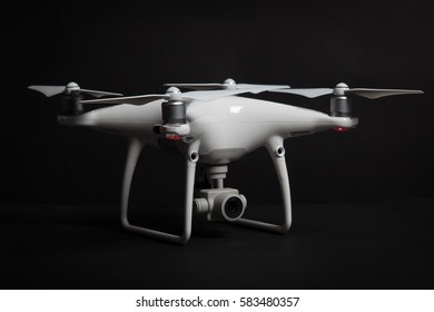 Varna, Bulgaria - February 9 ,2017: drone quadcopter Dji Phantom 4 PRO + in studio on black background