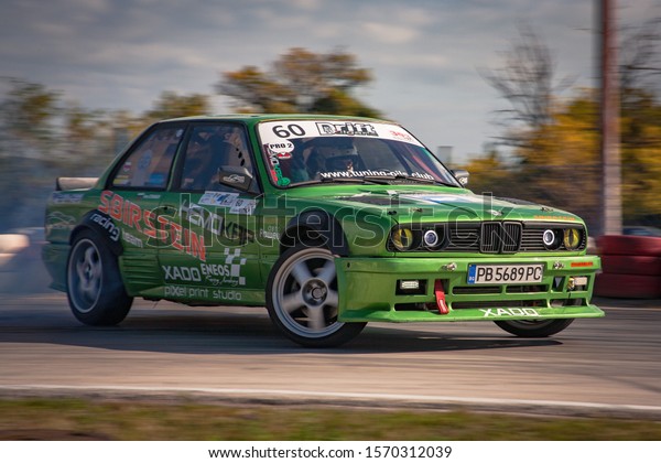Varna, Bulgaria - October 14, 2018:\
Drift of Bulgaria. Challenge Battle BMW E30 V8 Turbo with M3\
Engine. Full throttle drifting. Big drift angle. A lot of\
smoke