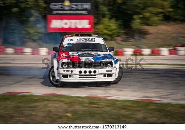 Varna, Bulgaria - October 14, 2018:
Drift of Bulgaria. Challenge Battle BMW E30 Turbo with V8 Engine.
Full throttle drifting. Big drift angle. A lot of
smoke