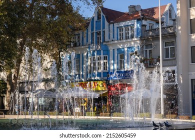 Varna, Bulgaria - September 3, 2021: Buildings and fountain on Independence Square in Varna