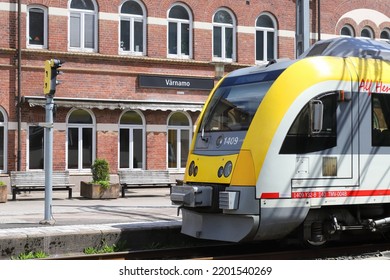 Varnamo, Sweden - June 13, 2022: Passenger Train Class Y32 In Front Of The Varnamo Railroad Station Building.