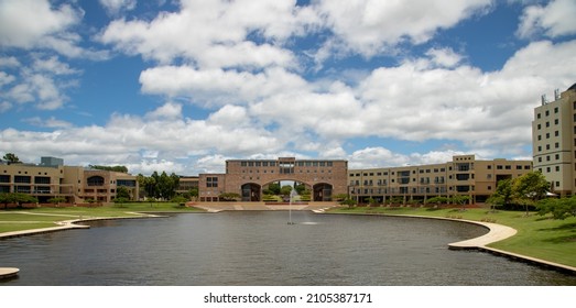 Varsity Lakes, Queensland Australia - January 3, 2021: Bond University arch building and water feature