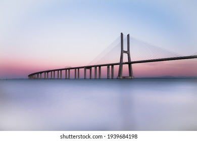 Vasco da Gama bridge at sunset. Lisbon bridge at sunset