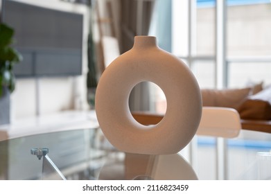 Vase With Hole In It  On Living Room Table 