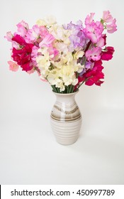 A Vase Of Sweet Pea Flowers