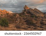 Vasquez Rocks Natural Area Park, looking west, located in the Sierra Pelona Mountains in Southern California, shown at dusk.