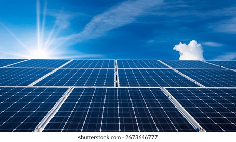 Vast array of solar panels at a power plant, absorbing sunlight under a blue sky to generate clean, renewable electricity for a sustainable future