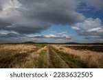 The vast country of Bangor Erris Bog, County Mayo, Ireland. Dark clouds are gathering, rain is coming.