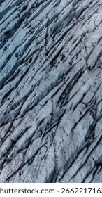 Vast ice formations create a mesmerizing visual at Svinafellsjokull Glacier in Iceland.