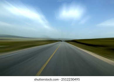 A vast, open road stretches towards the horizon, lined by green fields and a clear blue sky. The image evokes a sense of freedom and endless possibilities. - Powered by Shutterstock