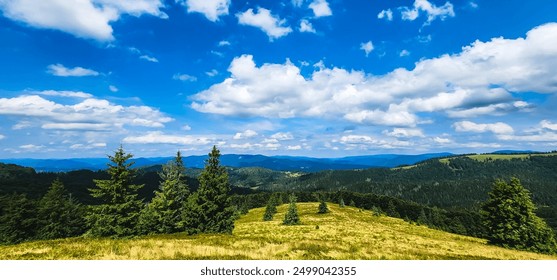 A vast, rolling landscape with layers of green hills and mountains, lush valleys and patches of forest under a partly cloudy, dynamic blue sky with white cumulus clouds - Powered by Shutterstock