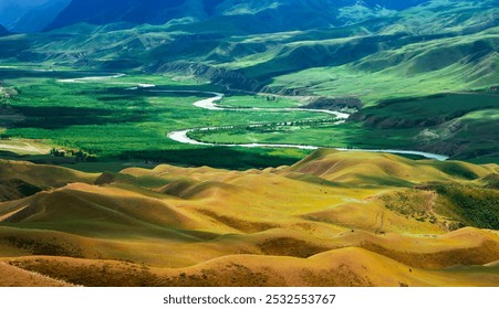 Vast valley with lush meandering river, vibrant green hills, and misty mountain backdrop under a clear sky. - Powered by Shutterstock