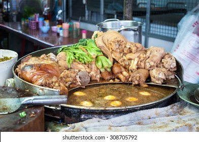 Vat Of Assorted Pork And Soup At A Thai Market