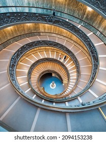 Vatican City, Italy - December 2021: Looking down the spiral staircase inside the Vatican Museum