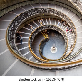 VATICAN CITY, ITALY - JULY 1, 2019: Bramante Staircase in Vatican Museum in the Vatican City. Rome, Italy. The double helix spiral staircase is is the famous travel destination.