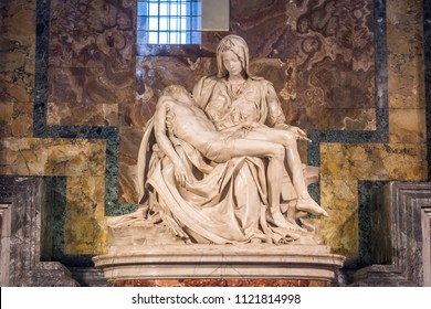 Vatican City, Italy - June 2018 - The Piety of the Vatican or Pieta is a sculptural group in marble by Michelangelo in the interior of Papal basilica of Saint Peter in Vatican City
