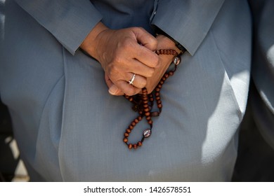 VATICAN CITY, June 09, 2019: A Nun Pray The Holy Rosary During Pope Francis Pentecost Holy Mass In St. Peter's Square, At The Vatican. 