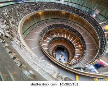 Vatican City State - October 29, 2019 : Bramante Staircase in Vatican Museums (Musei Vaticani). The modern double helix staircase was designed by Giuseppe Momo in 1932.