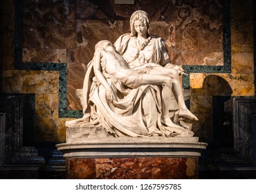 Vatican, Rome, Italy - December 9, 2018: La Pieta ("The Pity") 1499 Renaissance sculpture by Michelangelo Buonarroti, inside St. Peter's Basilica.