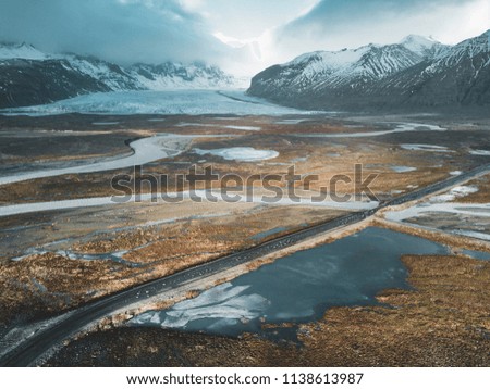 Similar – Image, Stock Photo Aerial view of Iceland’s majestic highland landscape