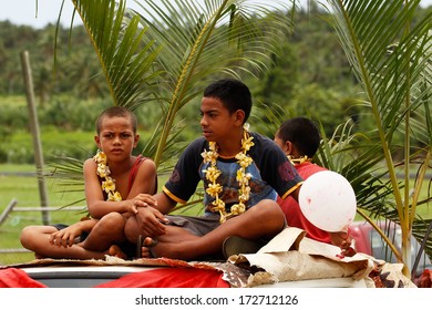 VAVAU, TONGA - NOVEMBER 17: Unidentified Boys Celebrate Arrival Of Fuifui Moimoi On His Home Island On November 17, 2013 In Tonga. Fuifui Is Tonga International Representative Forward In Rugby League.