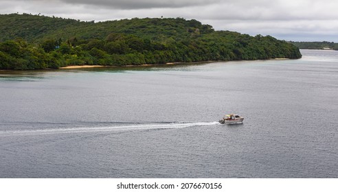 Vava'u,Tonga-October 24,2019: A boat heading out through the reefs and aqua coloured waters surrounding Tonga for recreational purposes for which this marine environment has become well known.