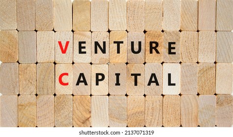 VC venture capital abbraviation symbol. Concept words VC venture capital on wooden blocks on a beautiful wooden background, copy space. Business and VC venture capital concept.