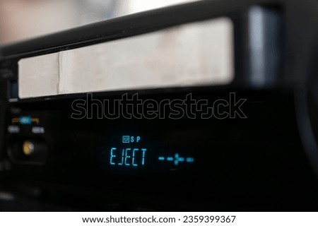 VCR ejecting a video cassette