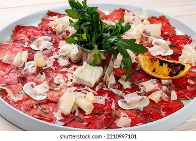 Veal Carpaccio With Parmesan Cheese And Mushrooms