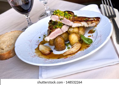 Veal and potatoes on a plate