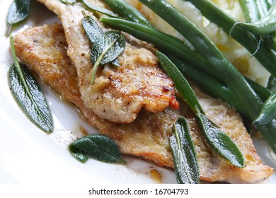 Veal Scaloppini With Sage Leaves, Served With Green Beans And Mashed Potato.