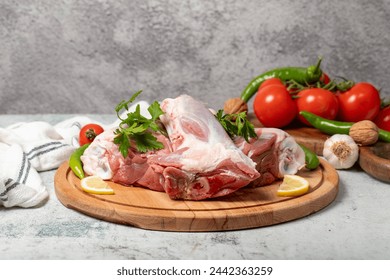 Veal shank. Raw beef shank on wood serving board - Powered by Shutterstock