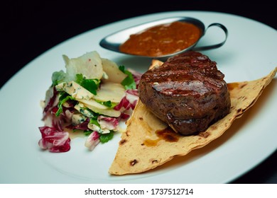 Veal Steak With Pear And Blue Cheese Salad With Sauce