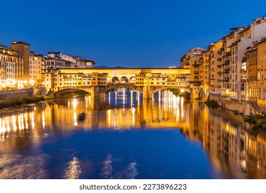 Vechio Bridge in Florence over the Arno River at night , Italy  - Powered by Shutterstock