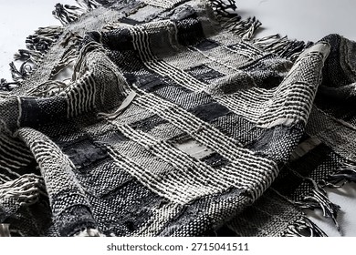 Vector fabric texture. Distressed texture of weaving fabric. Grunge background. Abstract halftone vector illustration. Overlay to create interesting effect and depth. Black isolated on white. EPS10.
