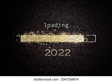 Vector illustration of golden loading bar symbolizing New Year 2022 with lettering and blinking sparkles on black background - Shutterstock ID 2047204874