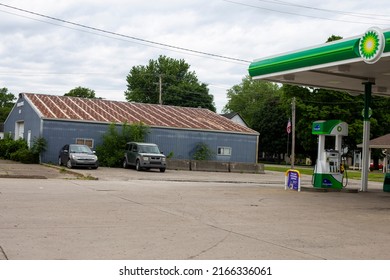 Veedersburg, Indiana United States June 1, 2022 An Outdoor Gray Metal Building By A BP Gas Station