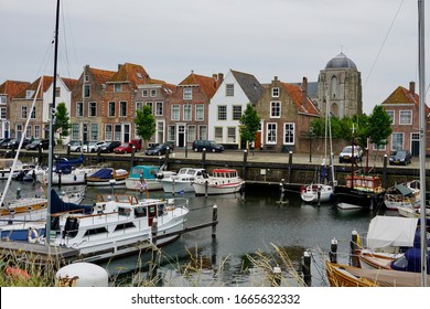 Veere, The Netherlands - june 14 2018; The pleasure boats in the city harbor of historic Veere