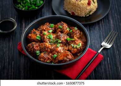 Veg Manchurian With A Bowl Of Fried Rice 