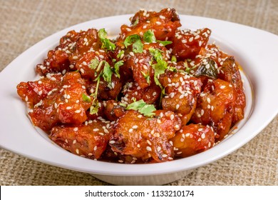Veg Manchurian with gravy - Popular food of India made of cauliflower florets and other vegetable