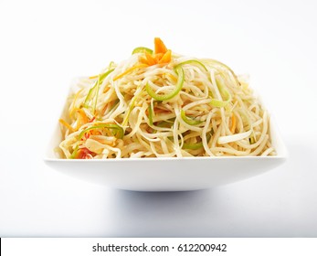 Veg Noodles Served In A White Bowl On White Background