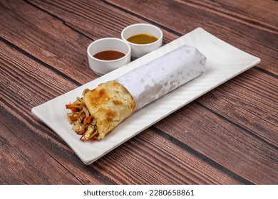 Veg Spring Roll OR Wrap also known as Franky, made using Paneer and Vegetables stuffed inside Chapati .