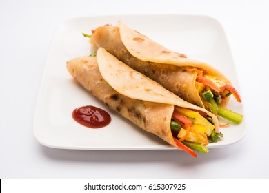 Veg Spring Roll OR Wrap also known as Franky, made using Paneer and Vegetables stuffed inside Chapati or Roti. Served with Tomato Ketchup. Selective focus